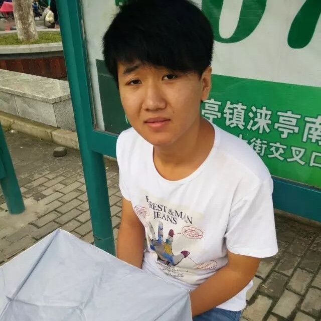 小丁的第一张照片--山西认干亲服务网